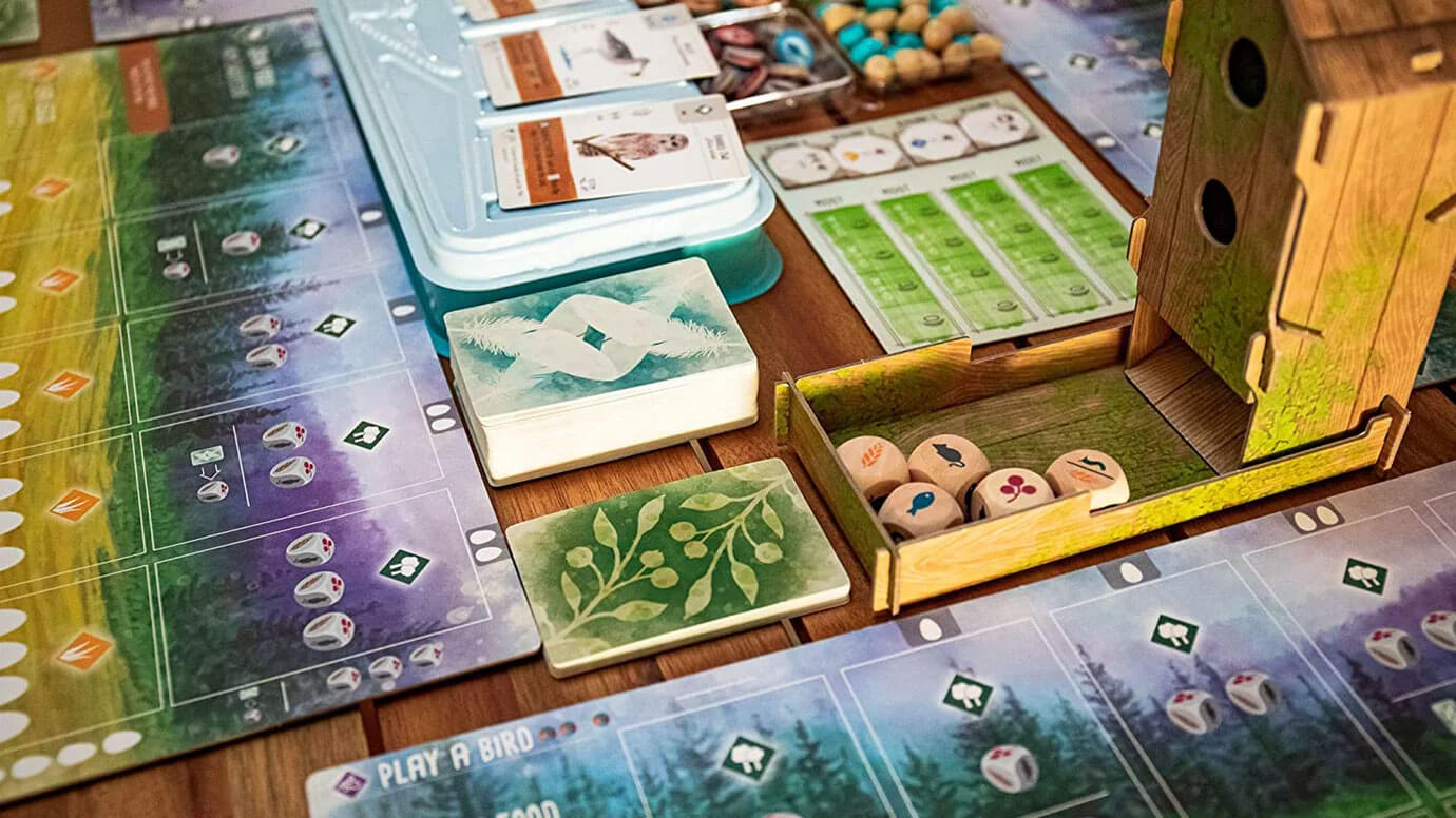 Wingspan three-habitat player board with birds placed across forest, grassland and wetland